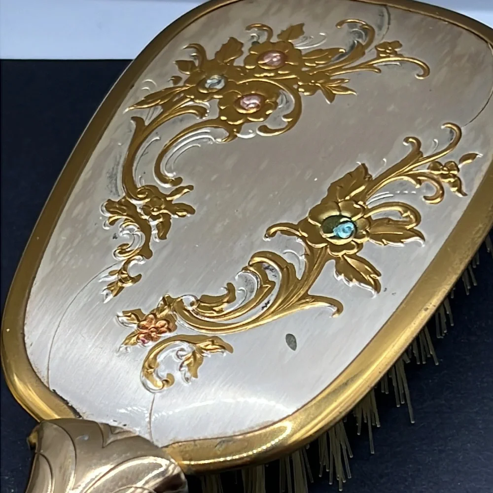 Vintage vanity hand mirror and brush